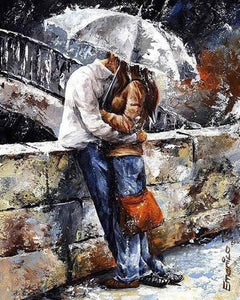 Lovers by a bridge in the rain